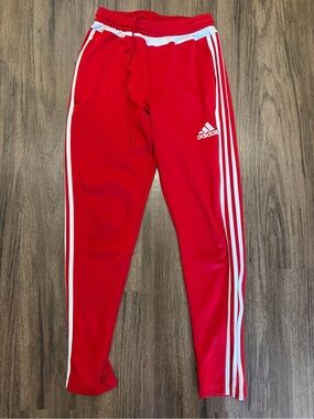 Red Adidas track pants